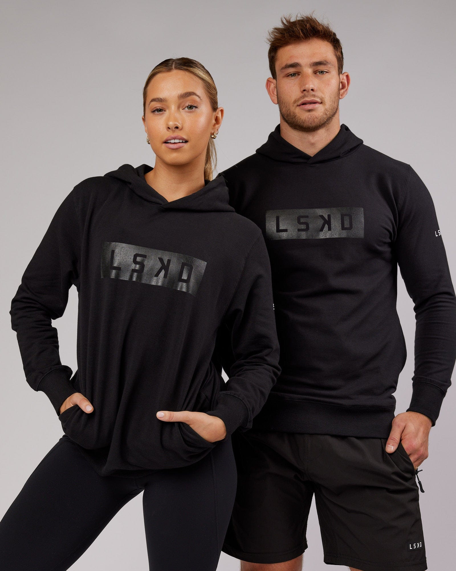 Model wearing Unisex Strength FLXFleece Training Fit Hoodie - Black