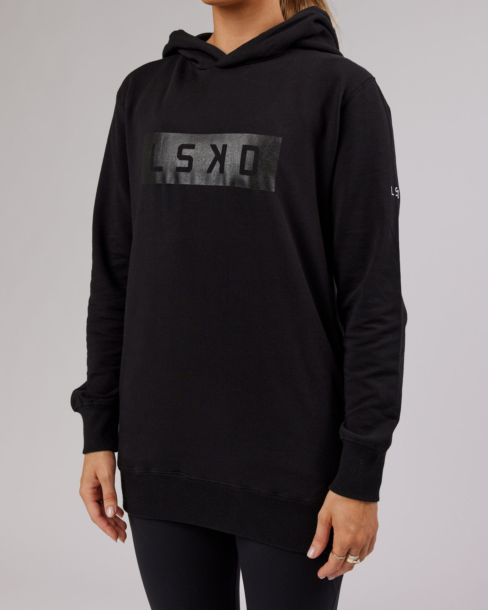 Model wearing Unisex Strength FLXFleece Training Fit Hoodie - Black