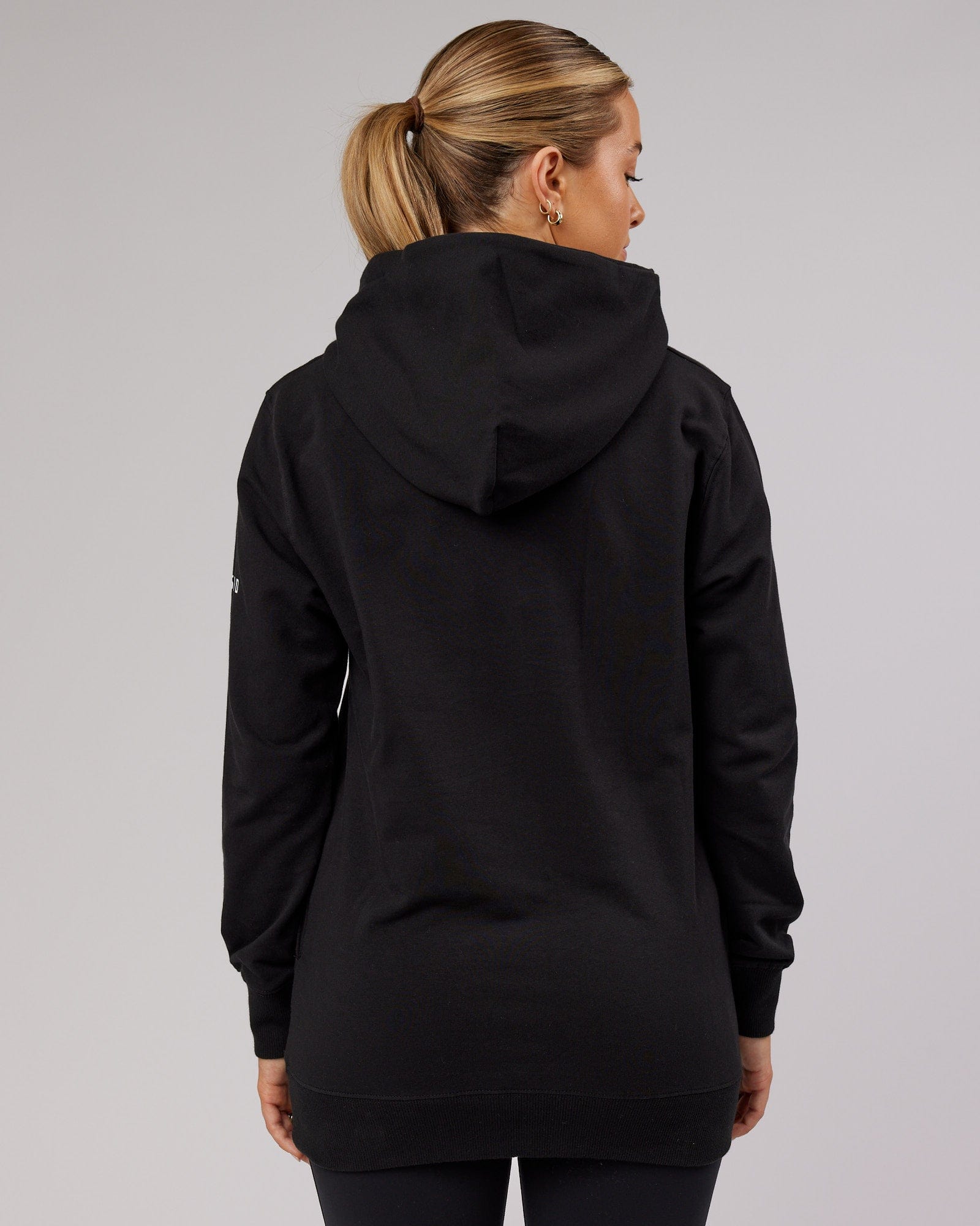 Model wearing Unisex Strength FLXFleece Training Fit Hoodie - Black