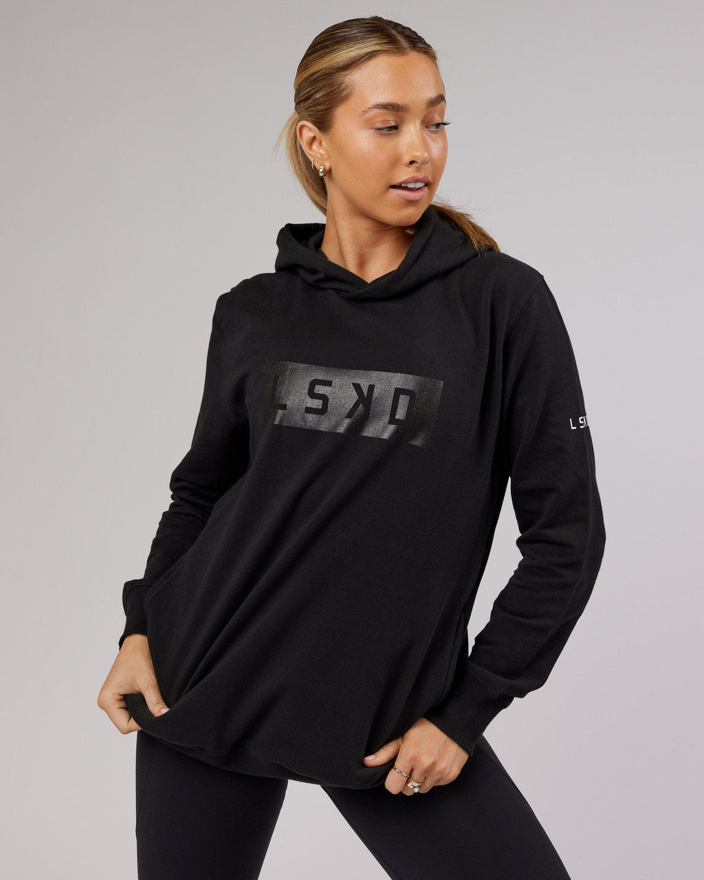 Model wearing Unisex Strength FLXFleece Training Fit Hoodie - Black