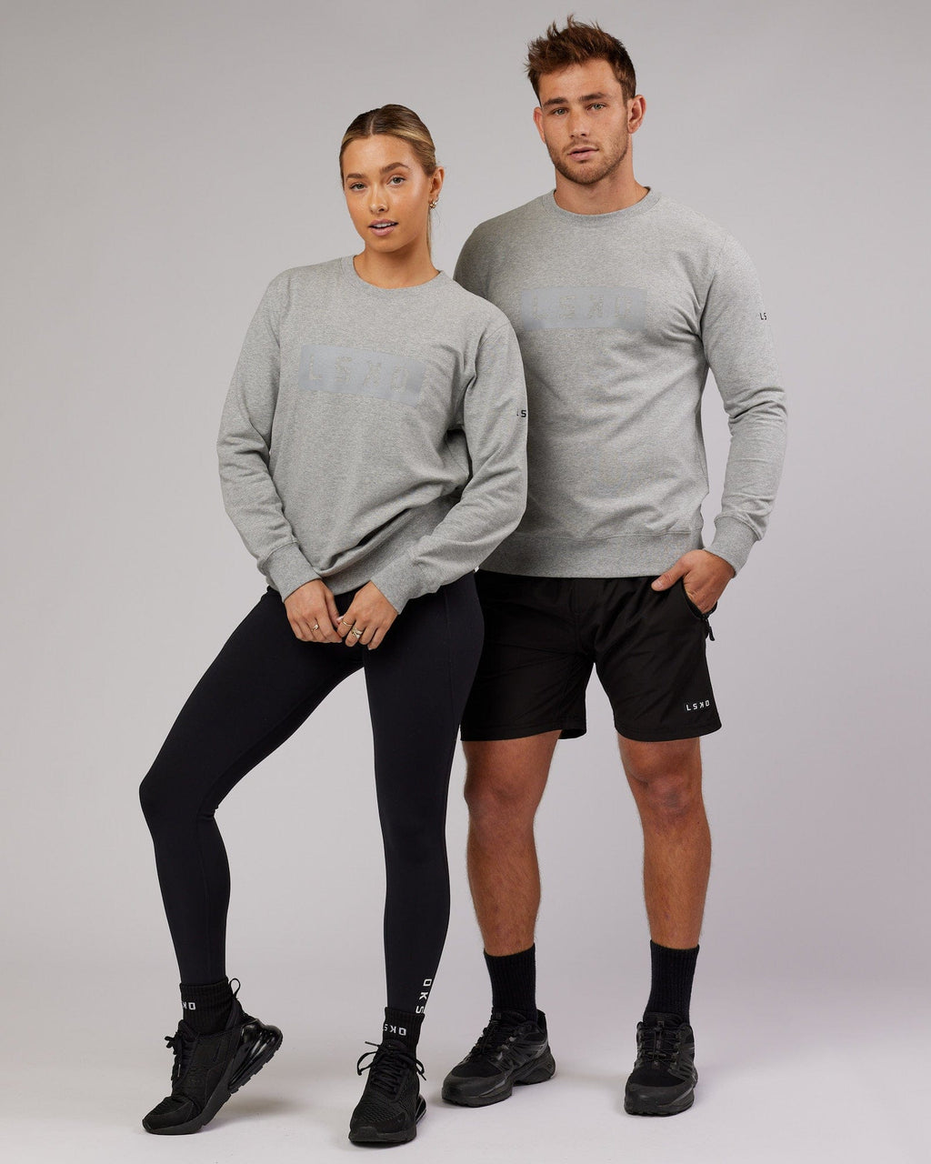 Model wearing Unisex Strength FLXFleece Training Fit Sweater - Lt Grey Marl