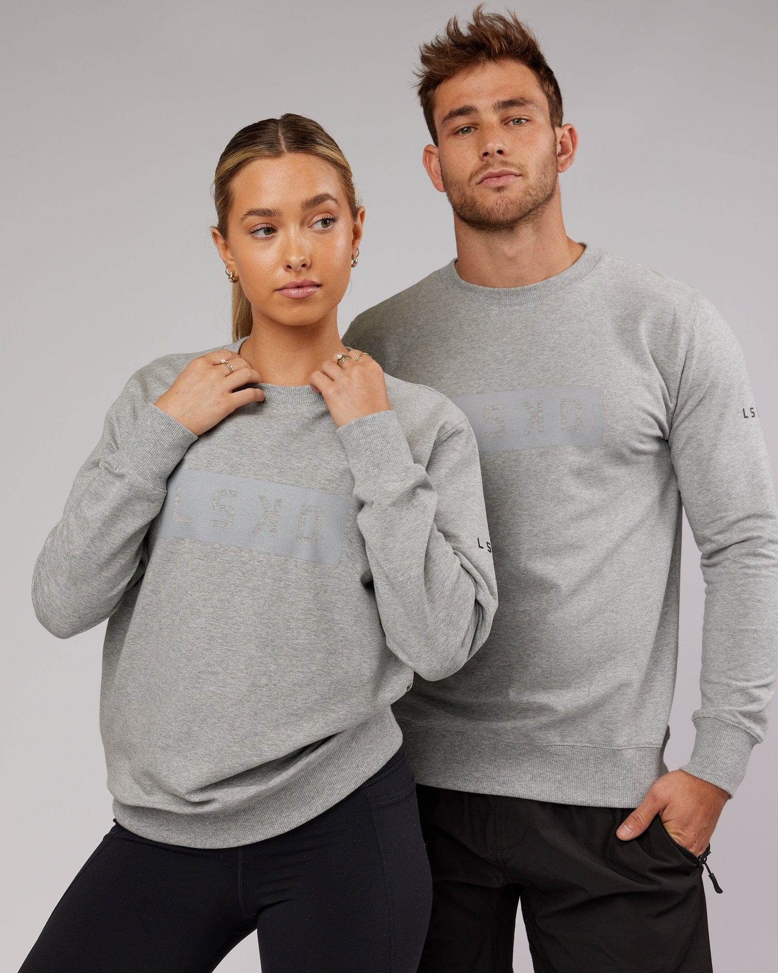Model wearing Unisex Strength FLXFleece Training Fit Sweater - Lt Grey Marl