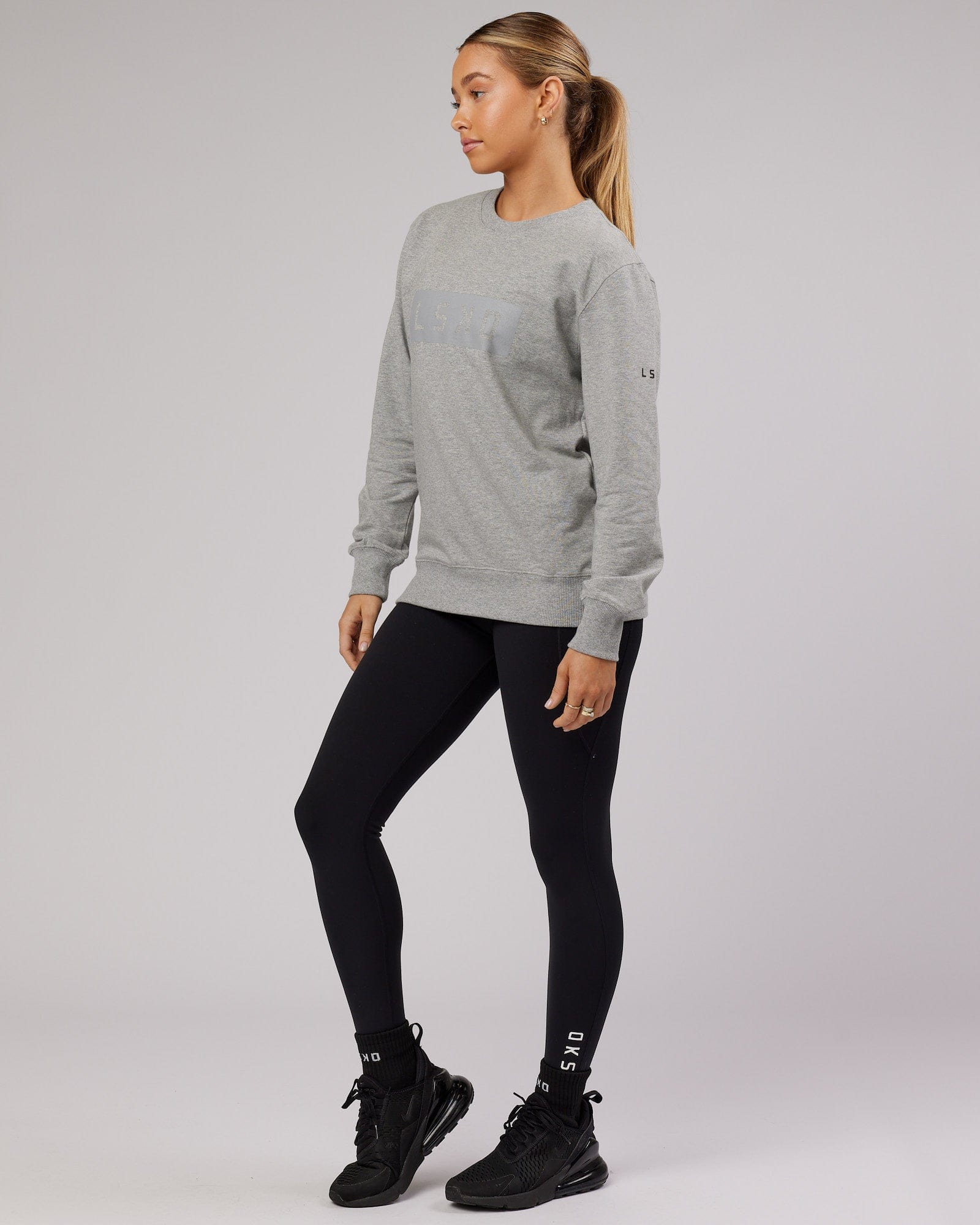 Model wearing Unisex Strength FLXFleece Training Fit Sweater - Lt Grey Marl