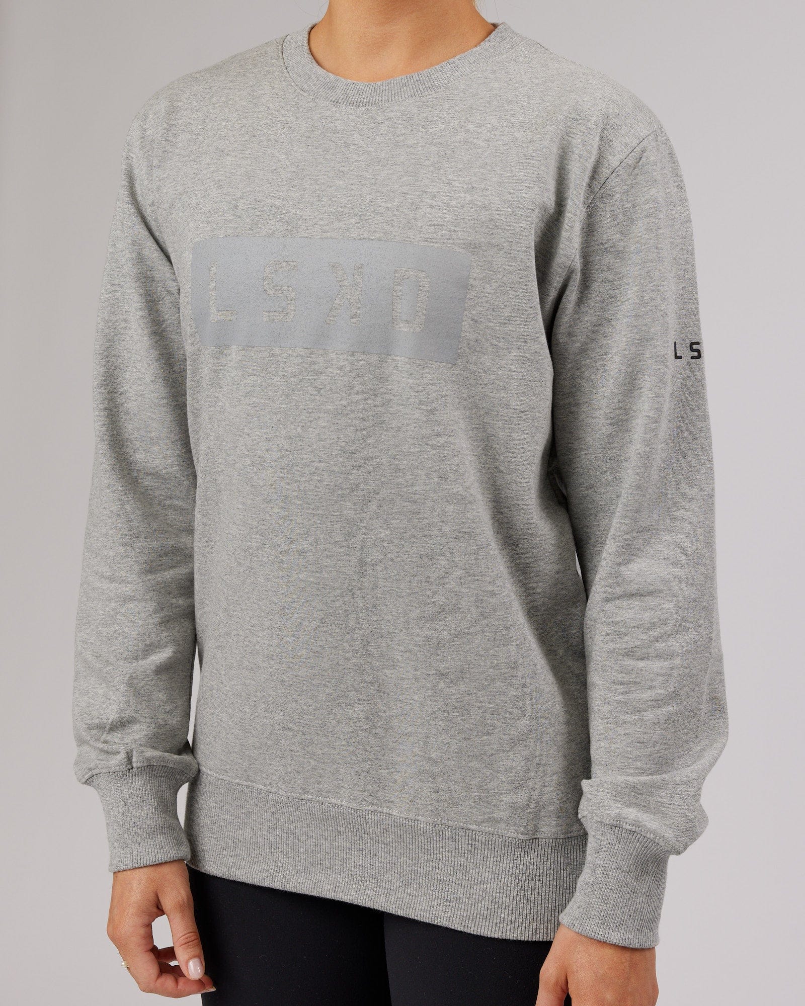 Model wearing Unisex Strength FLXFleece Training Fit Sweater - Lt Grey Marl