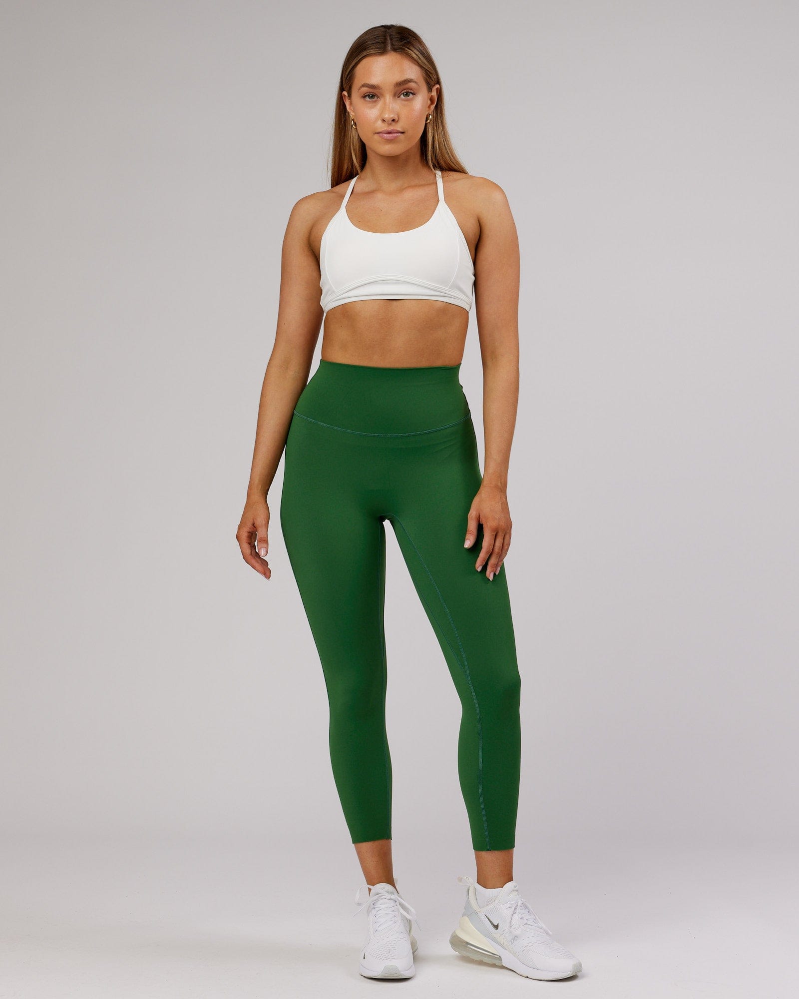 Model wearing Elixir 7/8 Length Tight - Eden Green No Logo