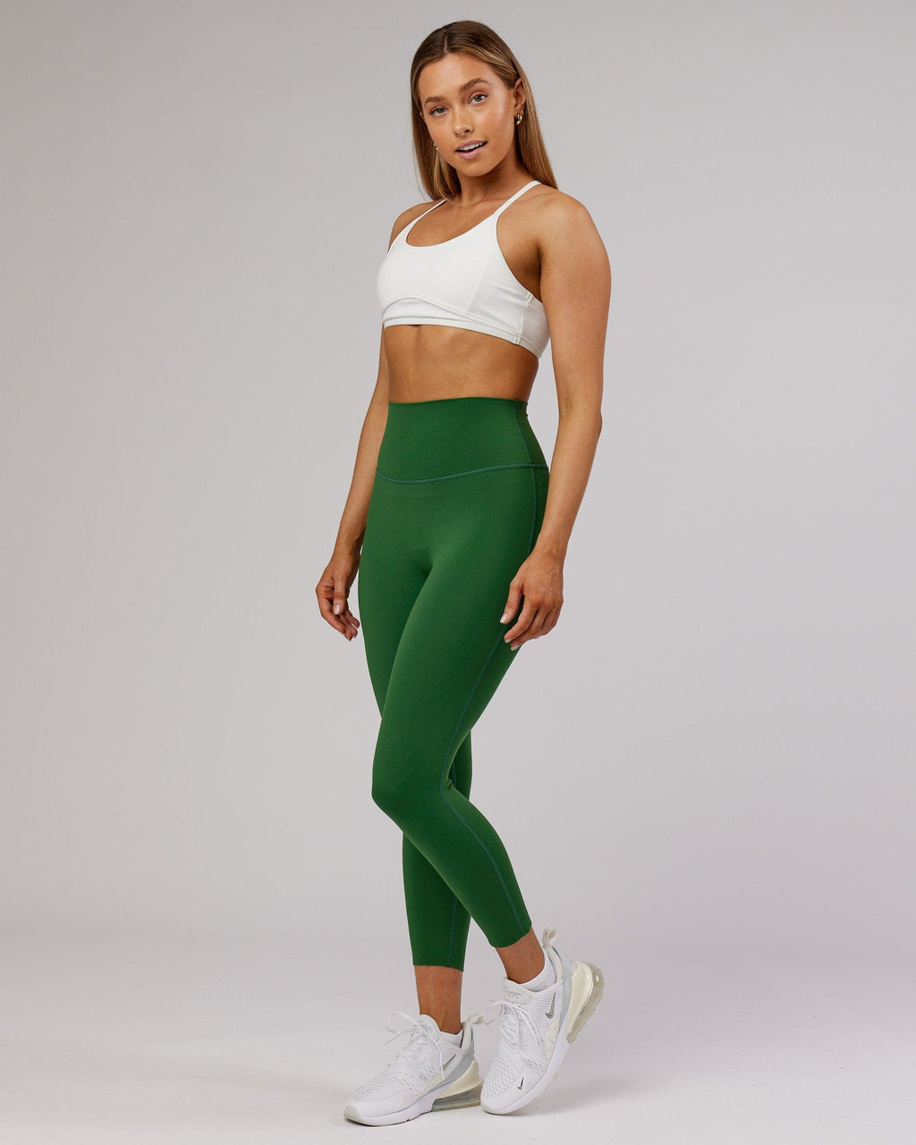 Model wearing Elixir 7/8 Length Tight - Eden Green No Logo