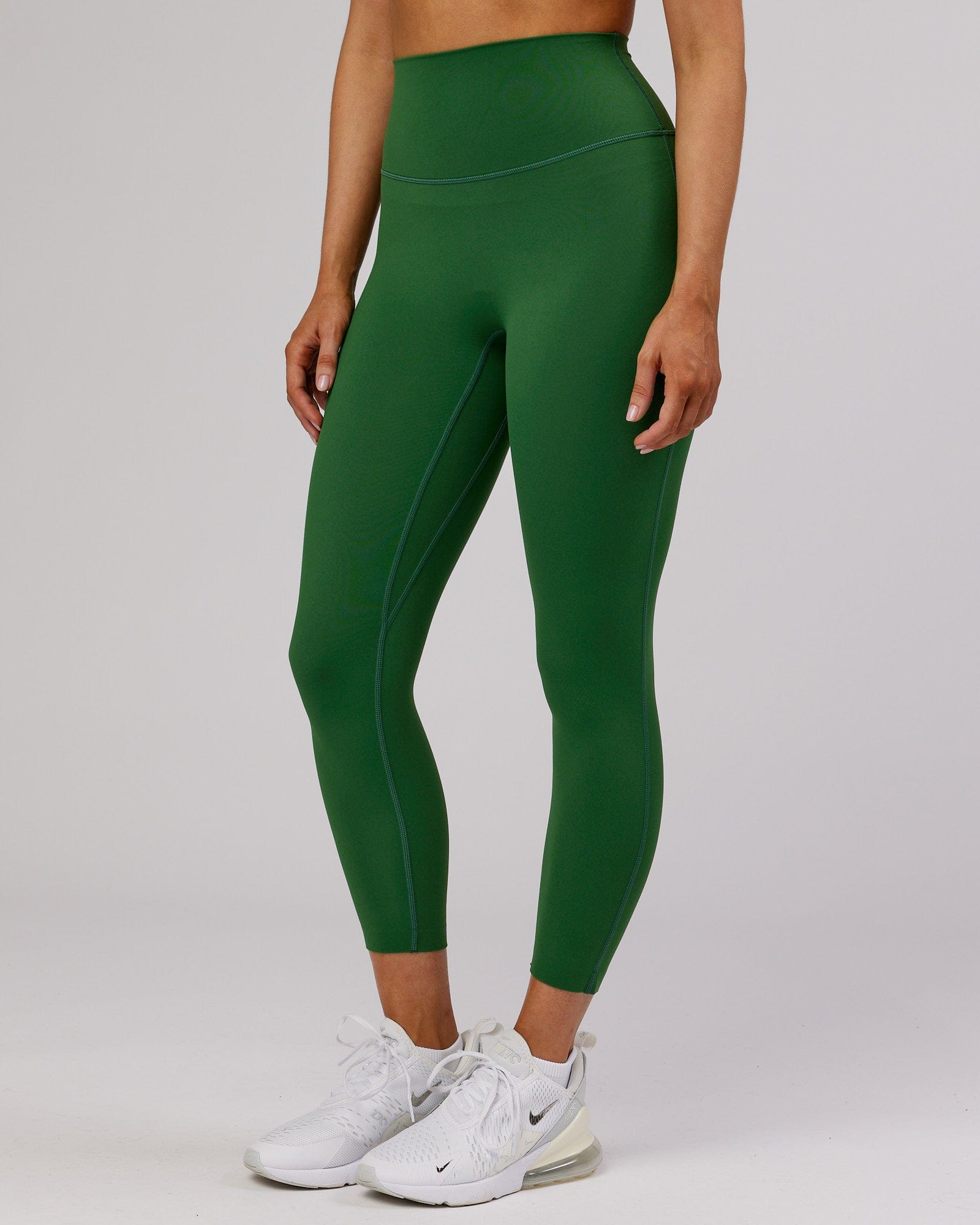 Model wearing Elixir 7/8 Length Tight - Eden Green No Logo