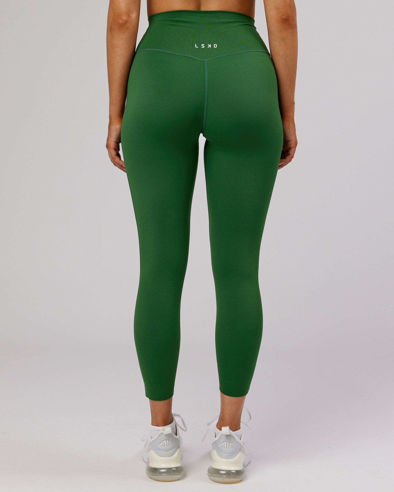 Model wearing Elixir 7/8 Length Tight - Eden Green No Logo