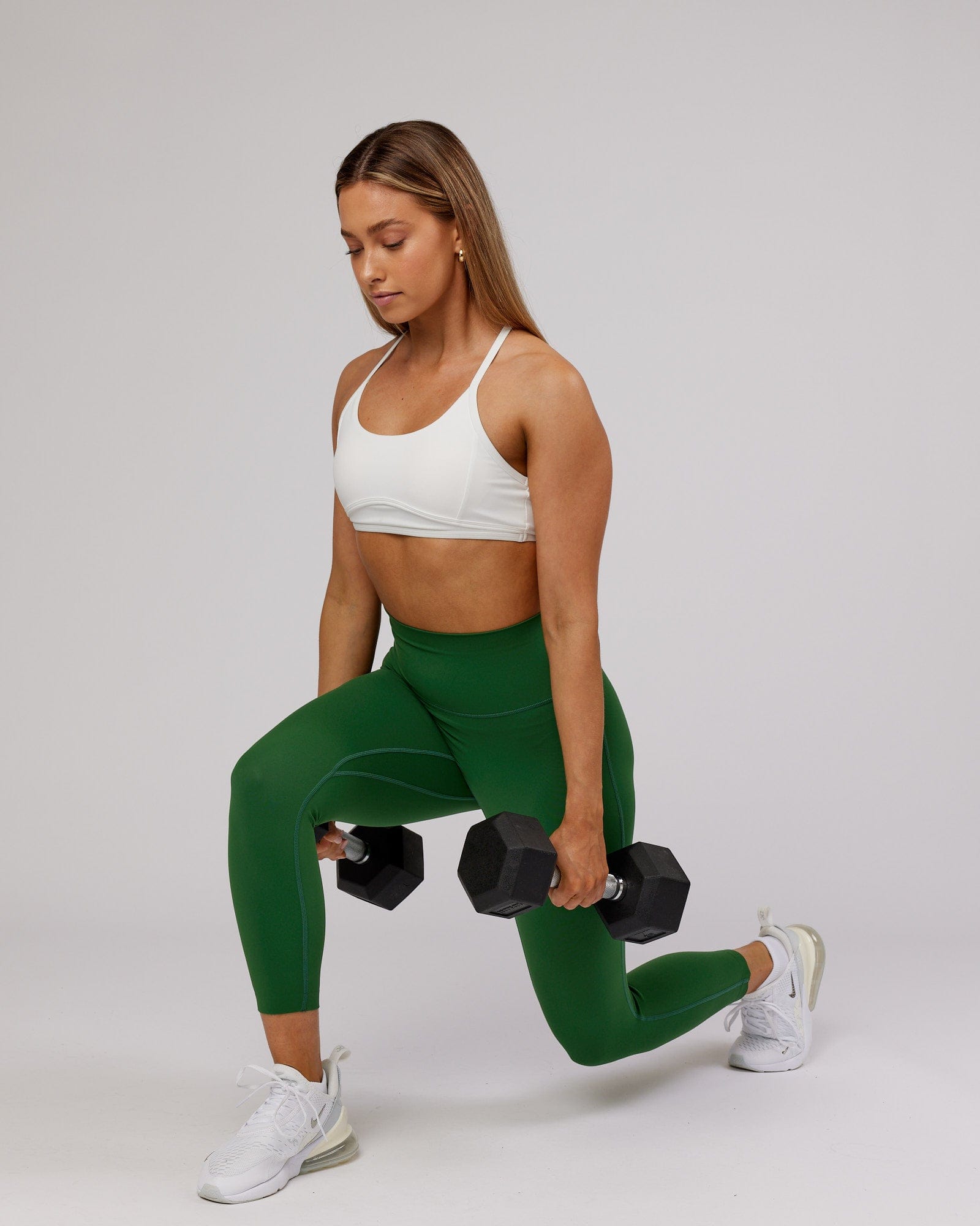 Model wearing Elixir 7/8 Length Tight - Eden Green No Logo