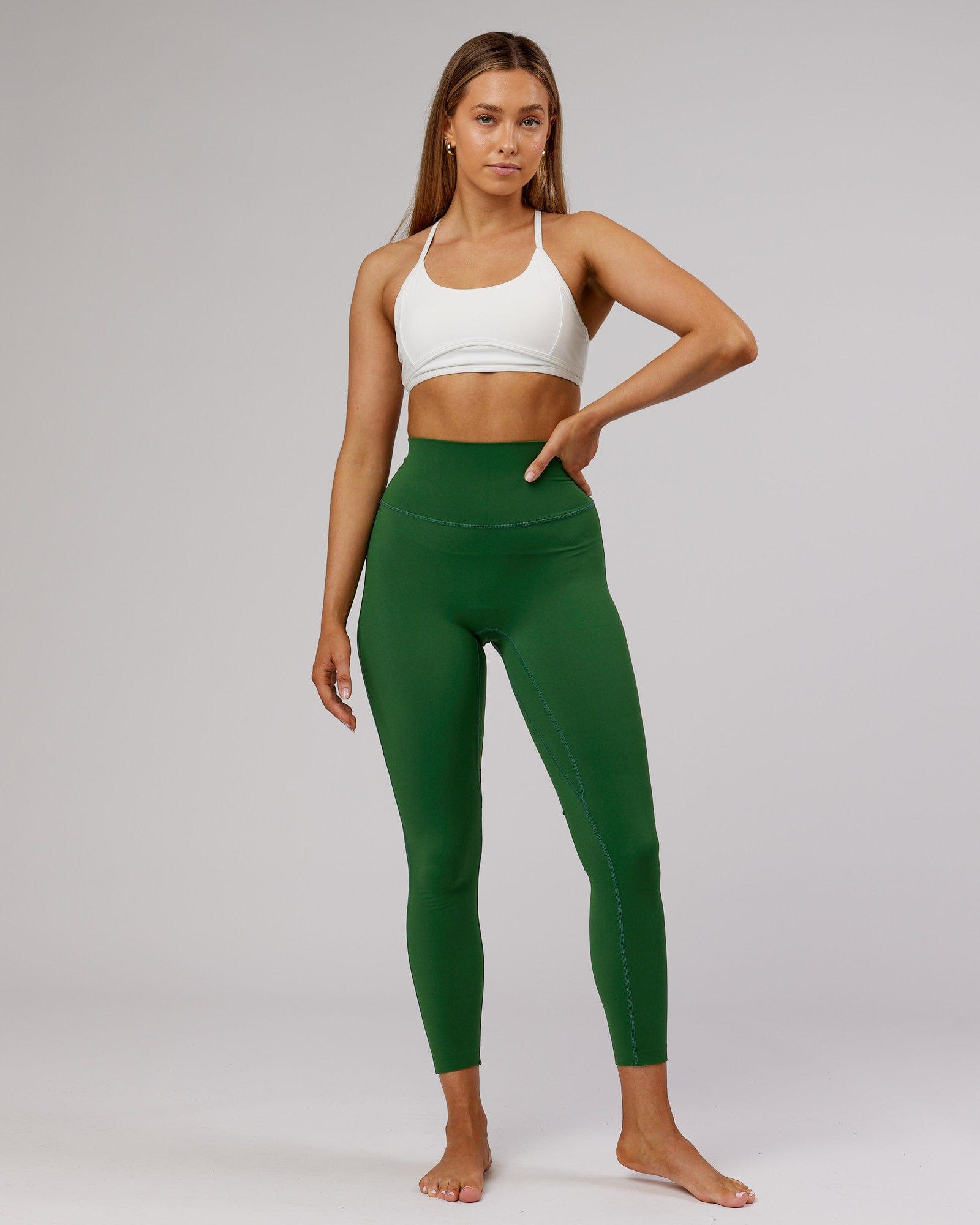 Model wearing Elixir Full Length Tight - Eden Green No Logo
