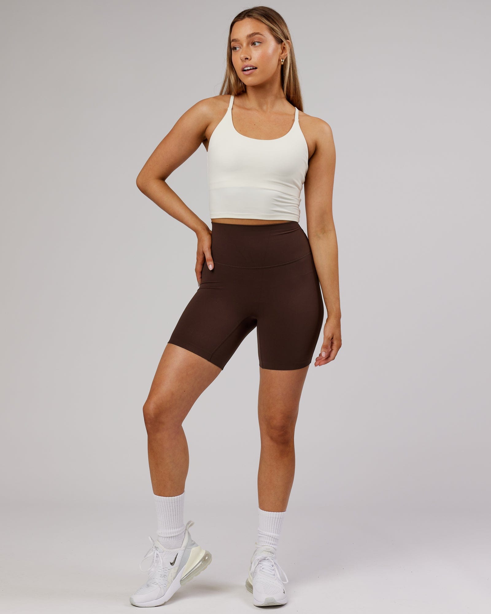 Model wearing Elixir Active Tank - Cream