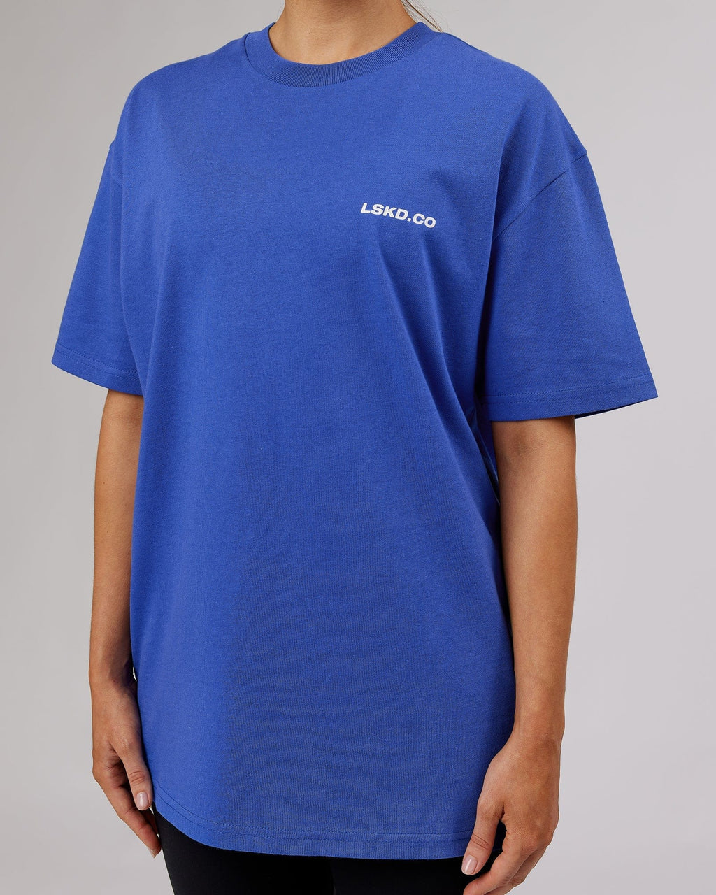 Model wearing Unisex Revolution Heavyweight Tee Oversize - Power Cobalt