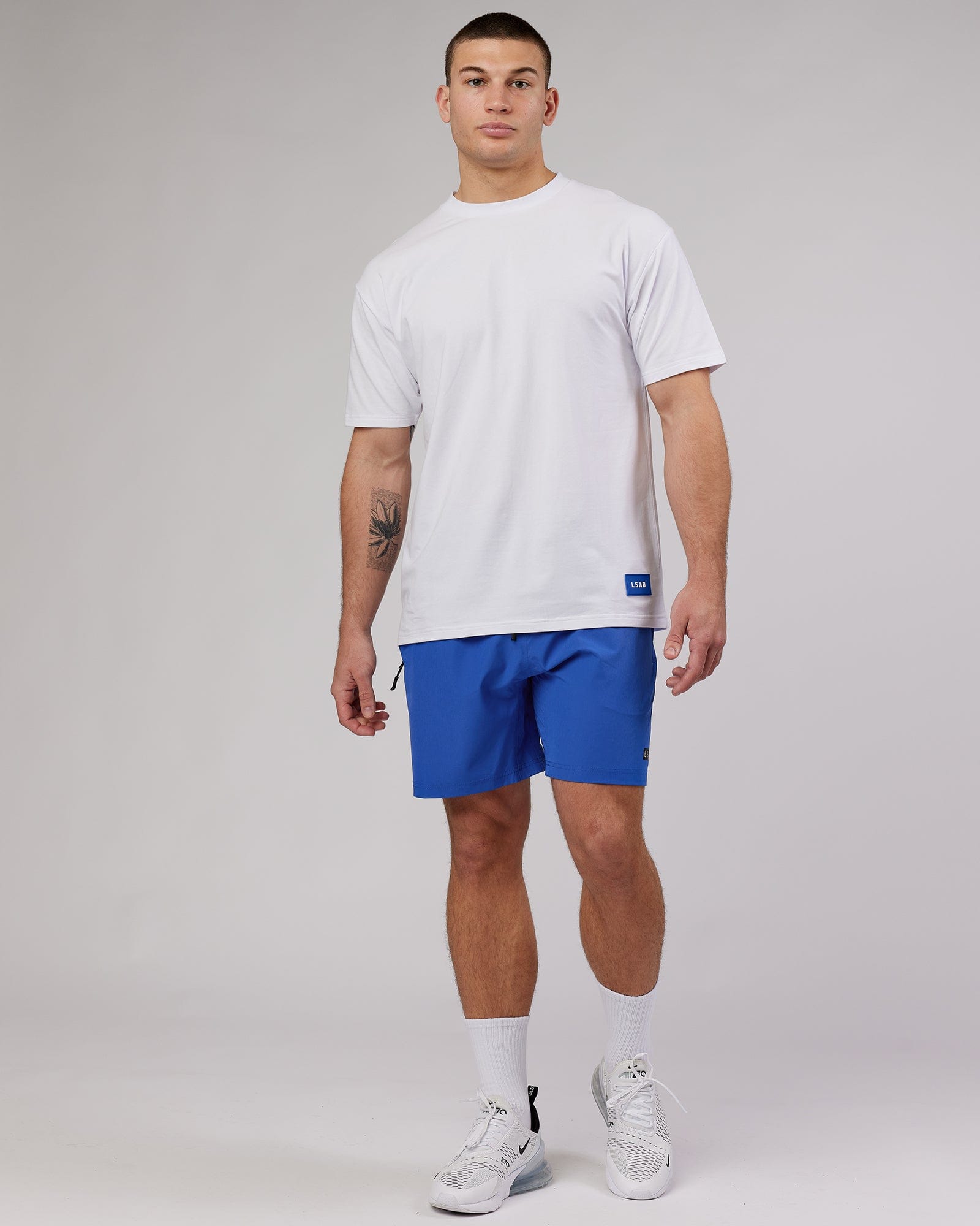 Model wearing Transfer FLXCotton Tee Oversize - White