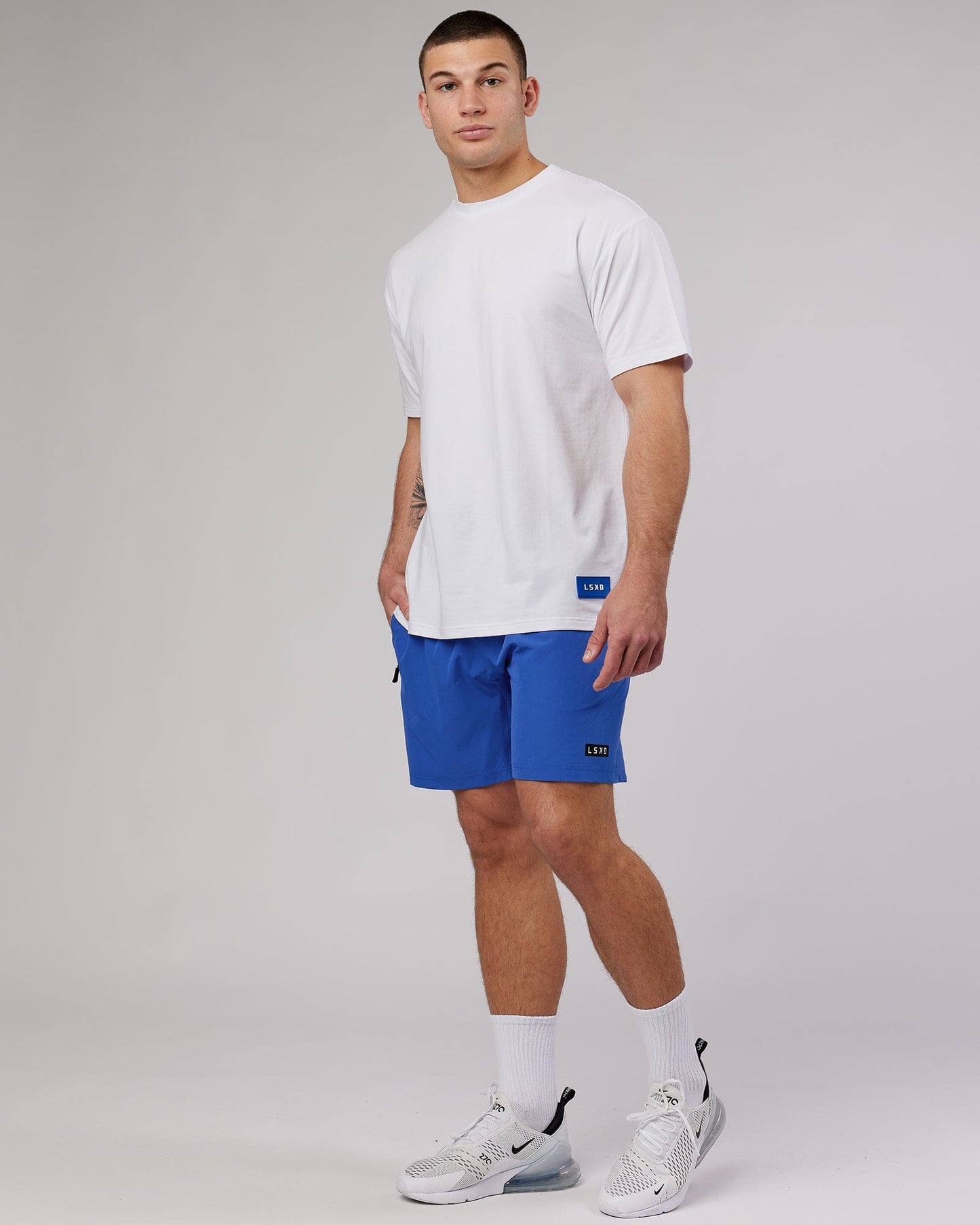 Model wearing Transfer FLXCotton Tee Oversize - White
