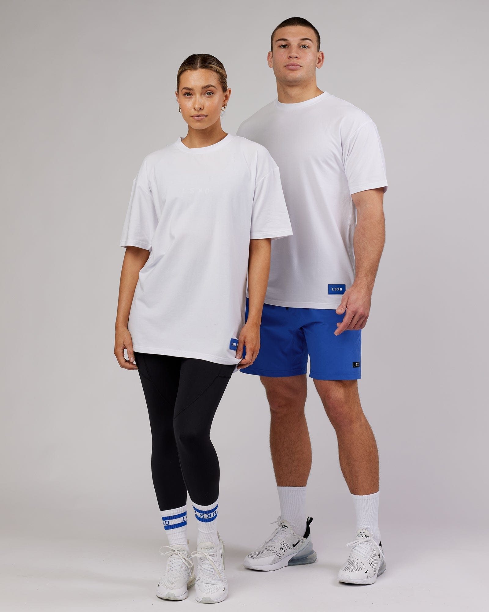 Model wearing Unisex Transfer FLXCotton Tee Oversize - White