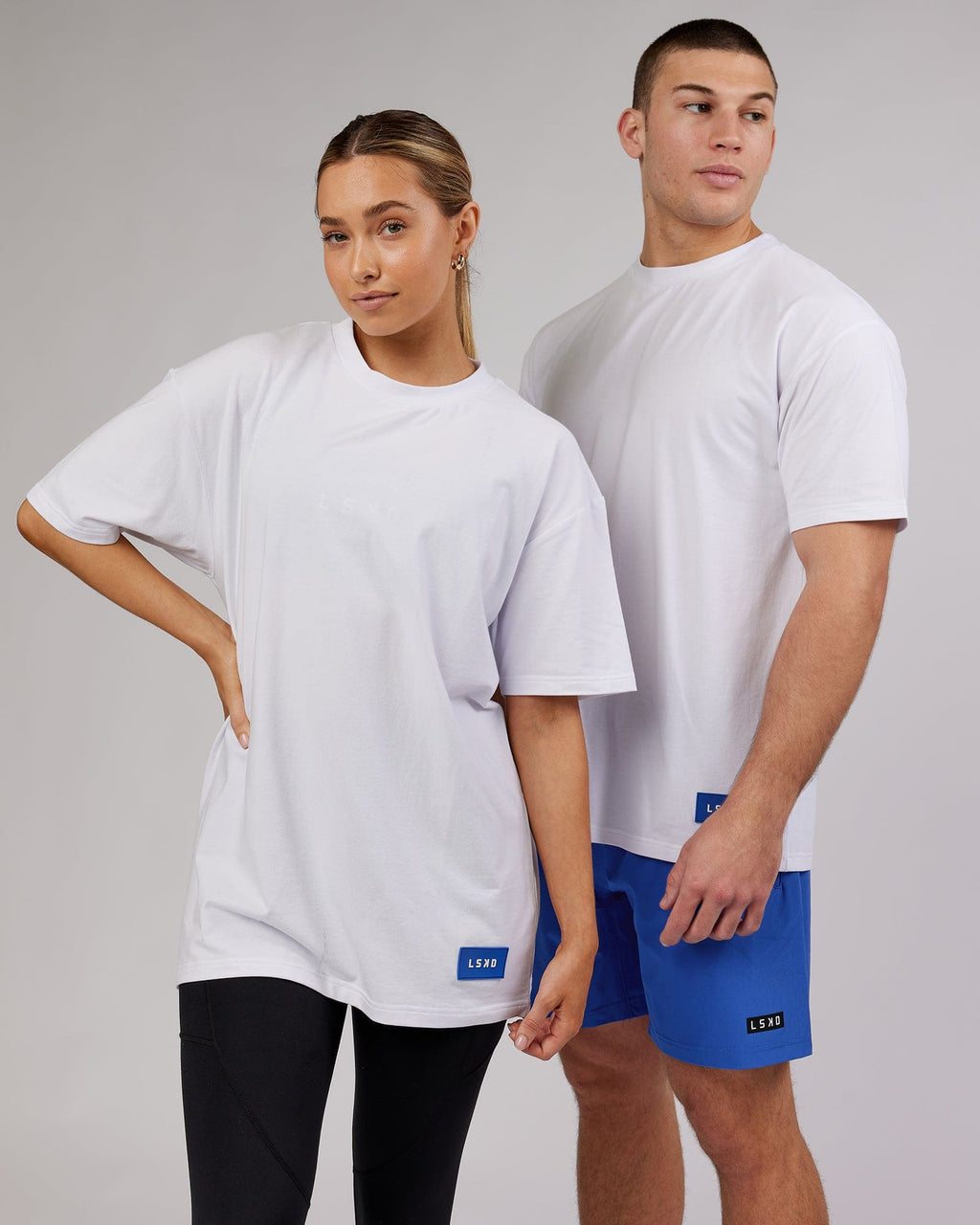 Model wearing Unisex Transfer FLXCotton Tee Oversize - White