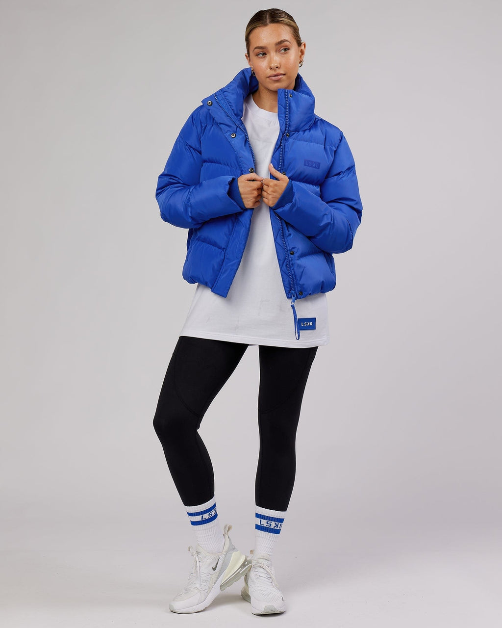 Model wearing Unisex Transfer FLXCotton Tee Oversize - White