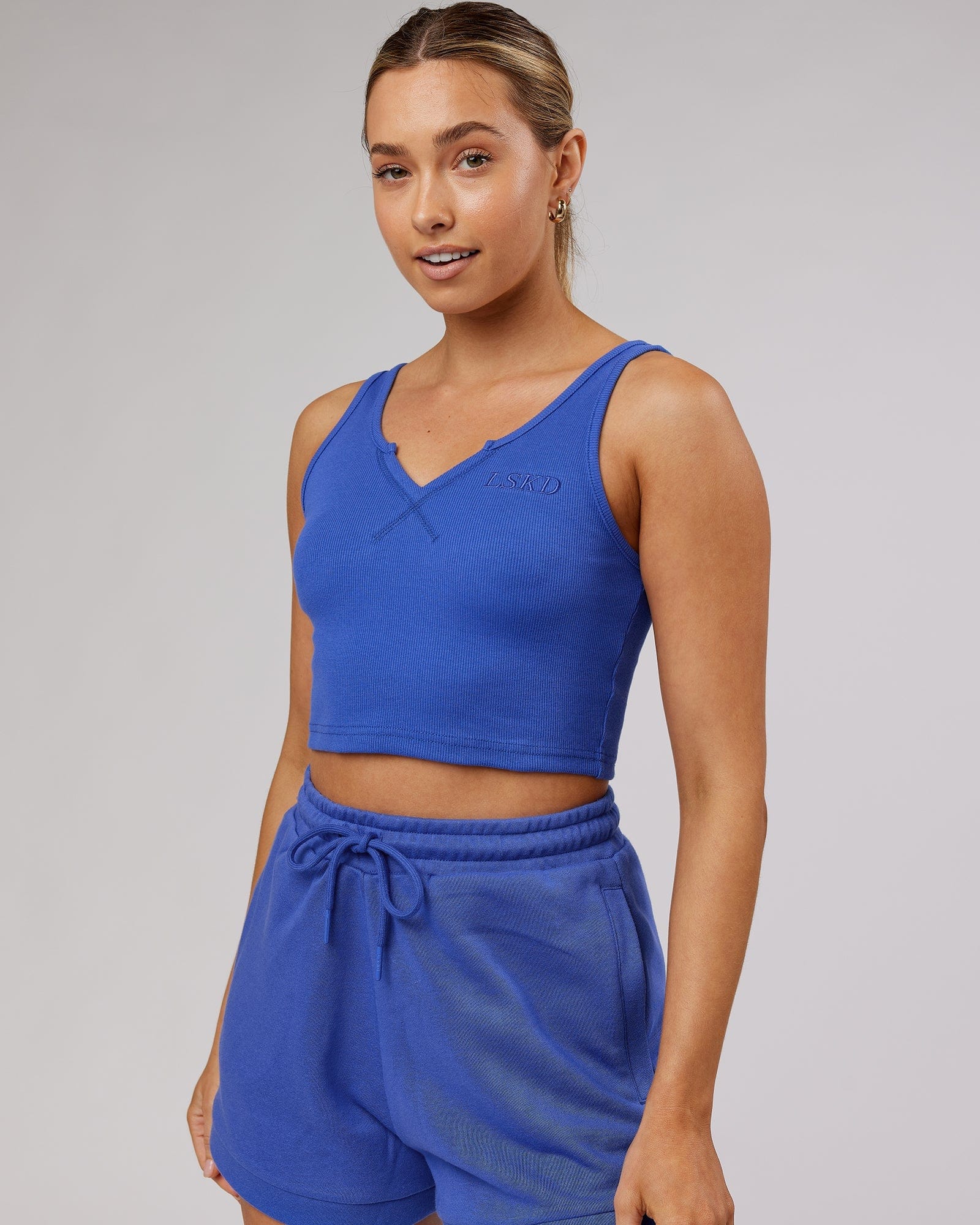 Model wearing Field Ribbed V-Neck Tank - Power Cobalt