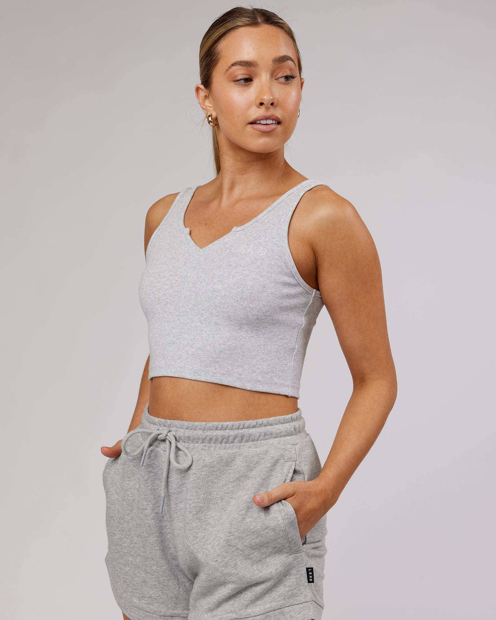 Model wearing Field Ribbed V-Neck Tank - Lt Grey Marl