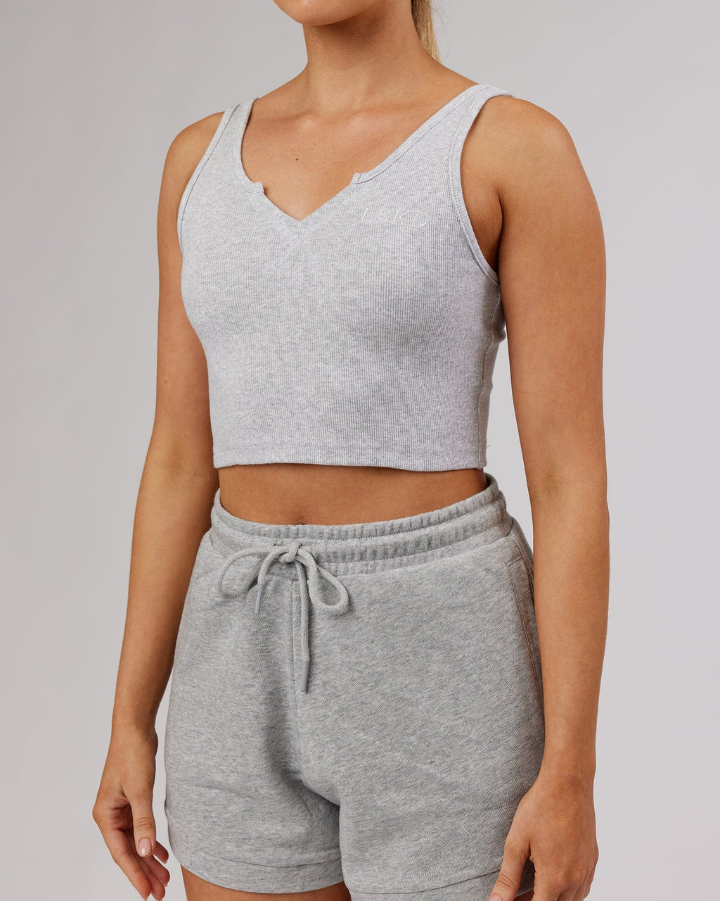 Model wearing Field Ribbed V-Neck Tank - Lt Grey Marl