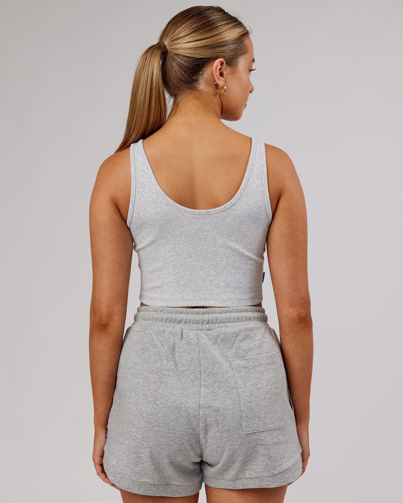 Model wearing Field Ribbed V-Neck Tank - Lt Grey Marl