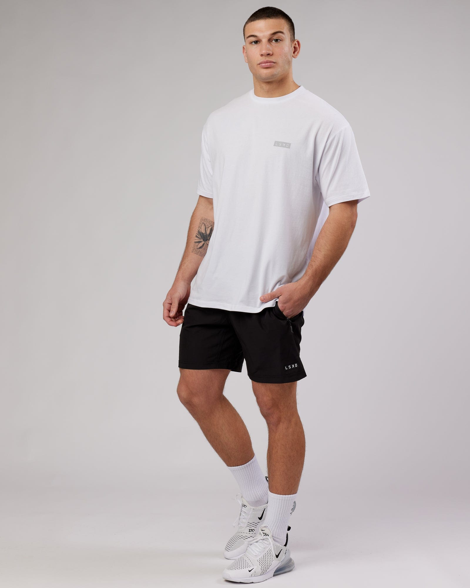 Model wearing MFBS FLXCotton Tee Oversize - White