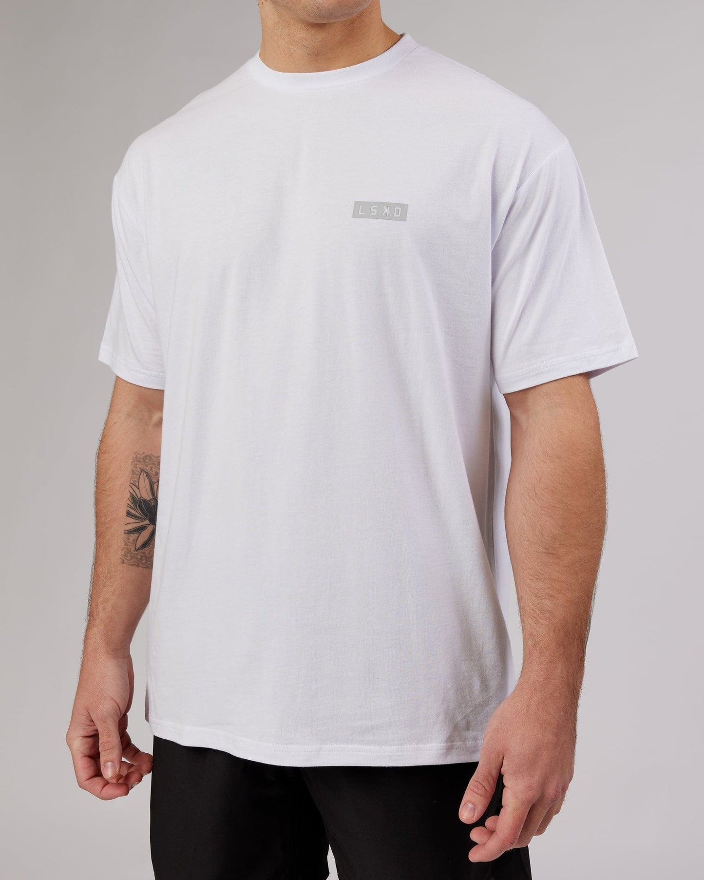 Model wearing MFBS FLXCotton Tee Oversize - White
