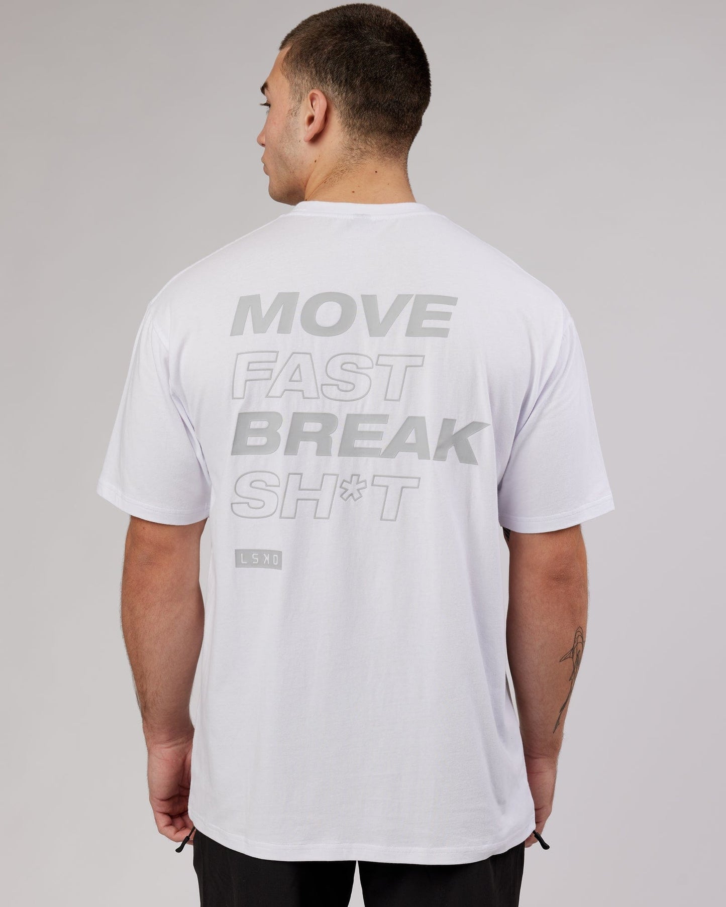 Model wearing MFBS FLXCotton Tee Oversize - White