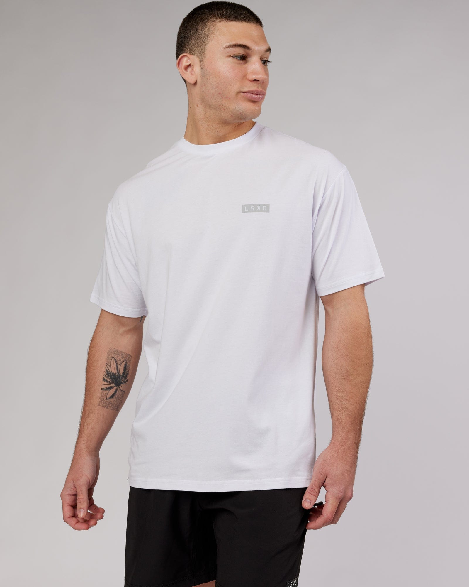 Model wearing MFBS FLXCotton Tee Oversize - White