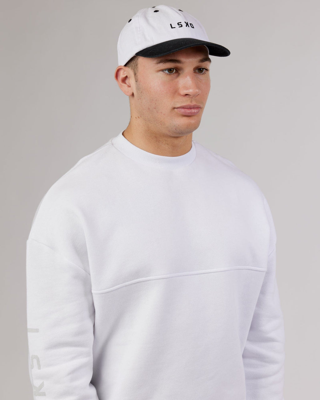 Model wearing Slouch Vintage Fit Cap - White-Black