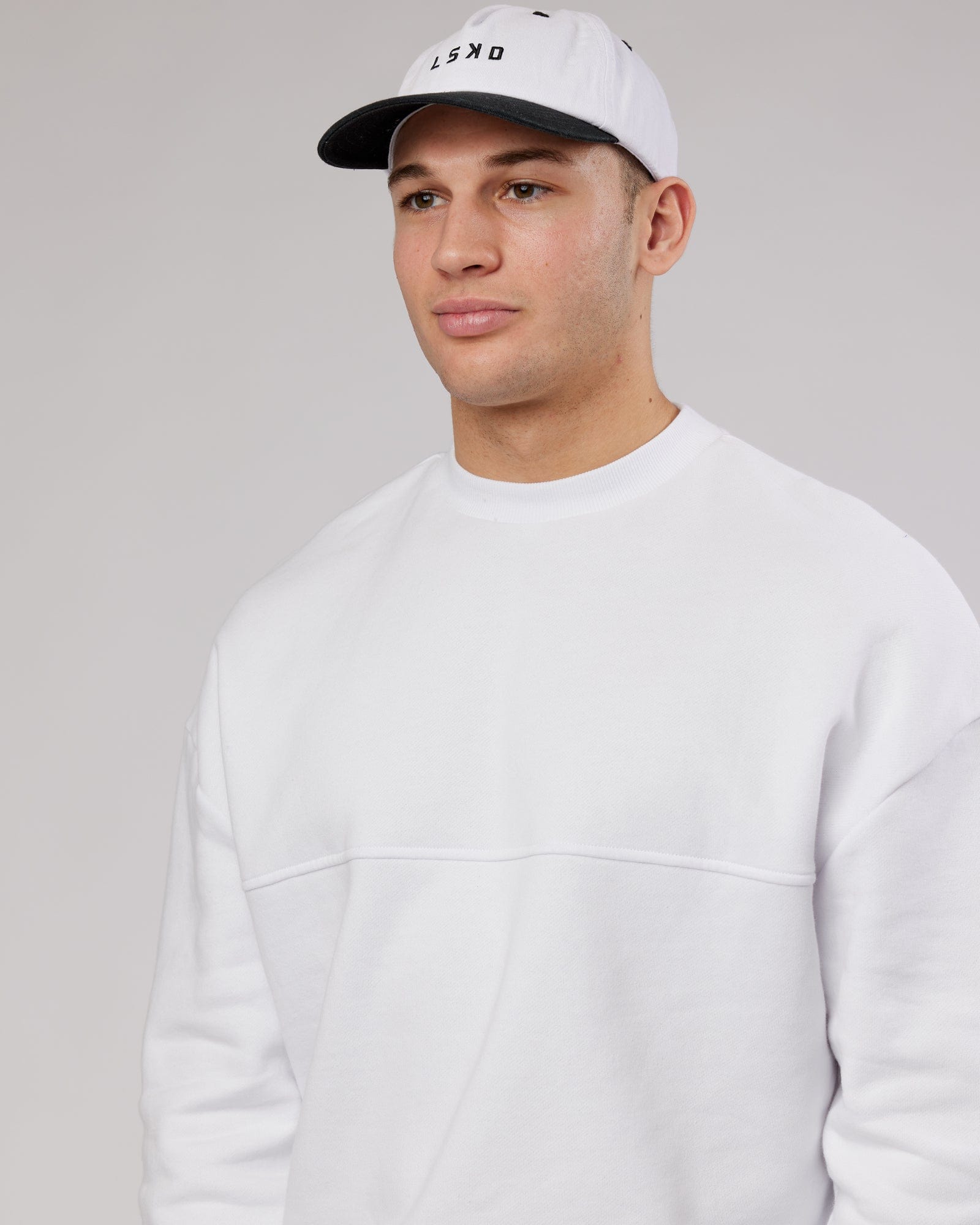 Model wearing Slouch Vintage Fit Cap - White-Black