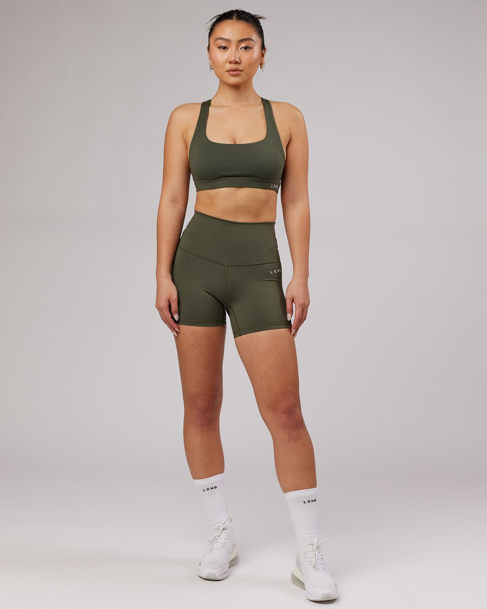 Model wearing Base X-Short Tight - Forest Night