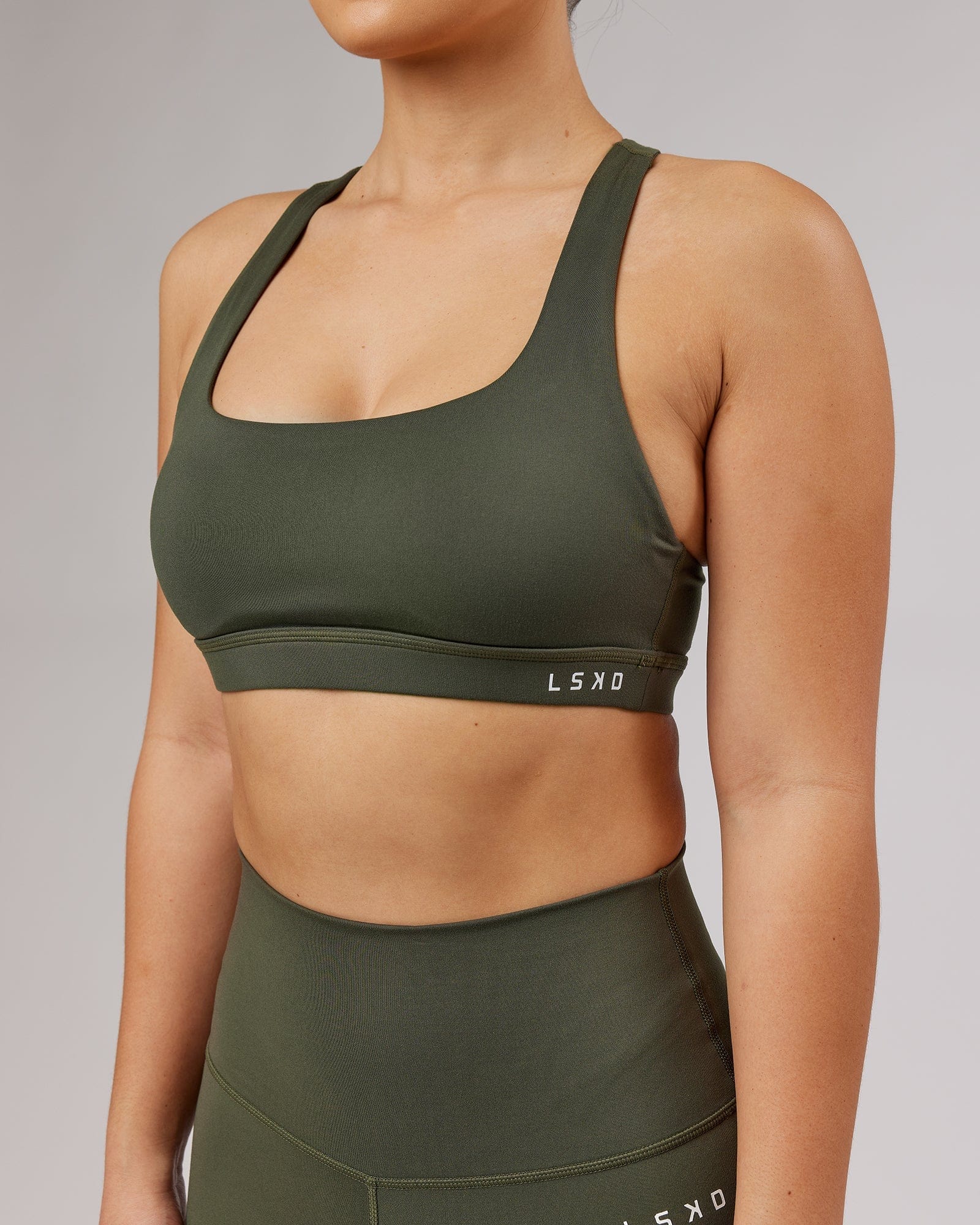 Model wearing Base Sports Bra - Forest Night