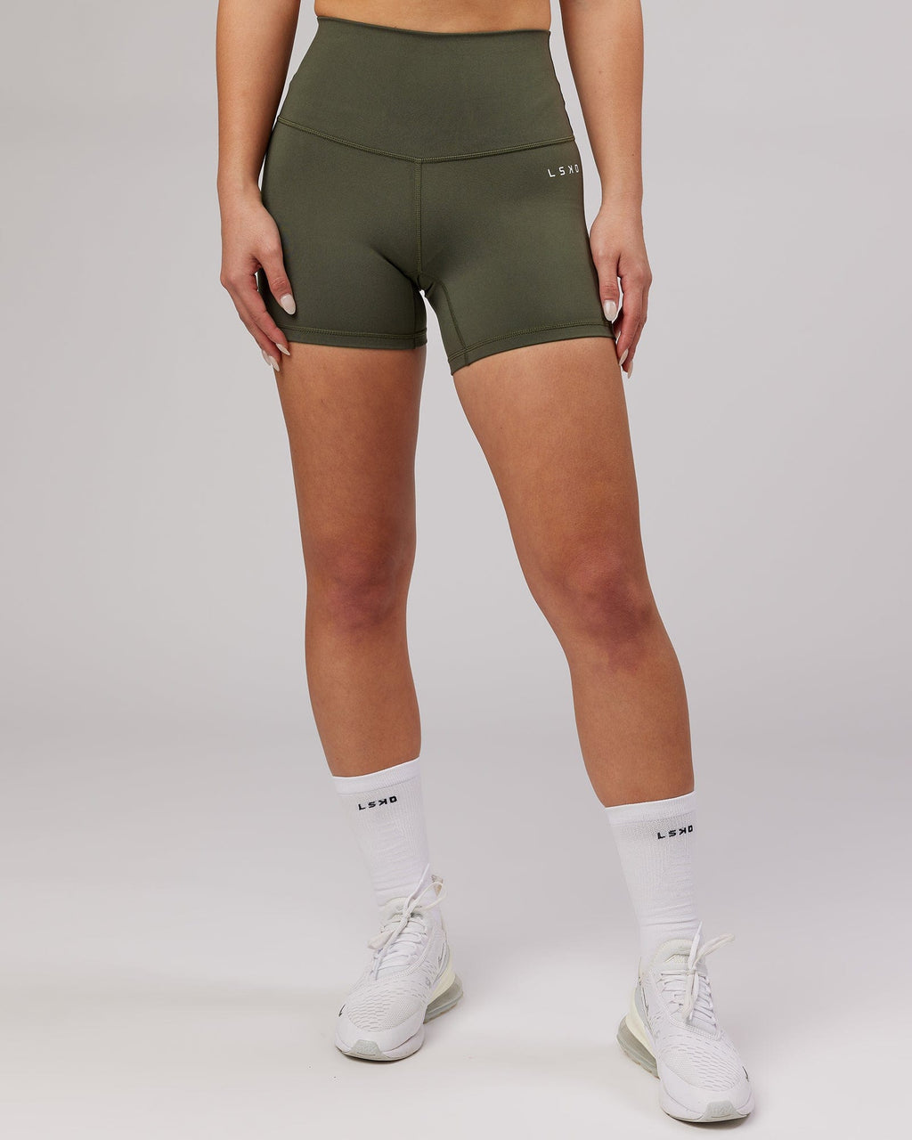 Model wearing Base X-Short Tight - Forest Night