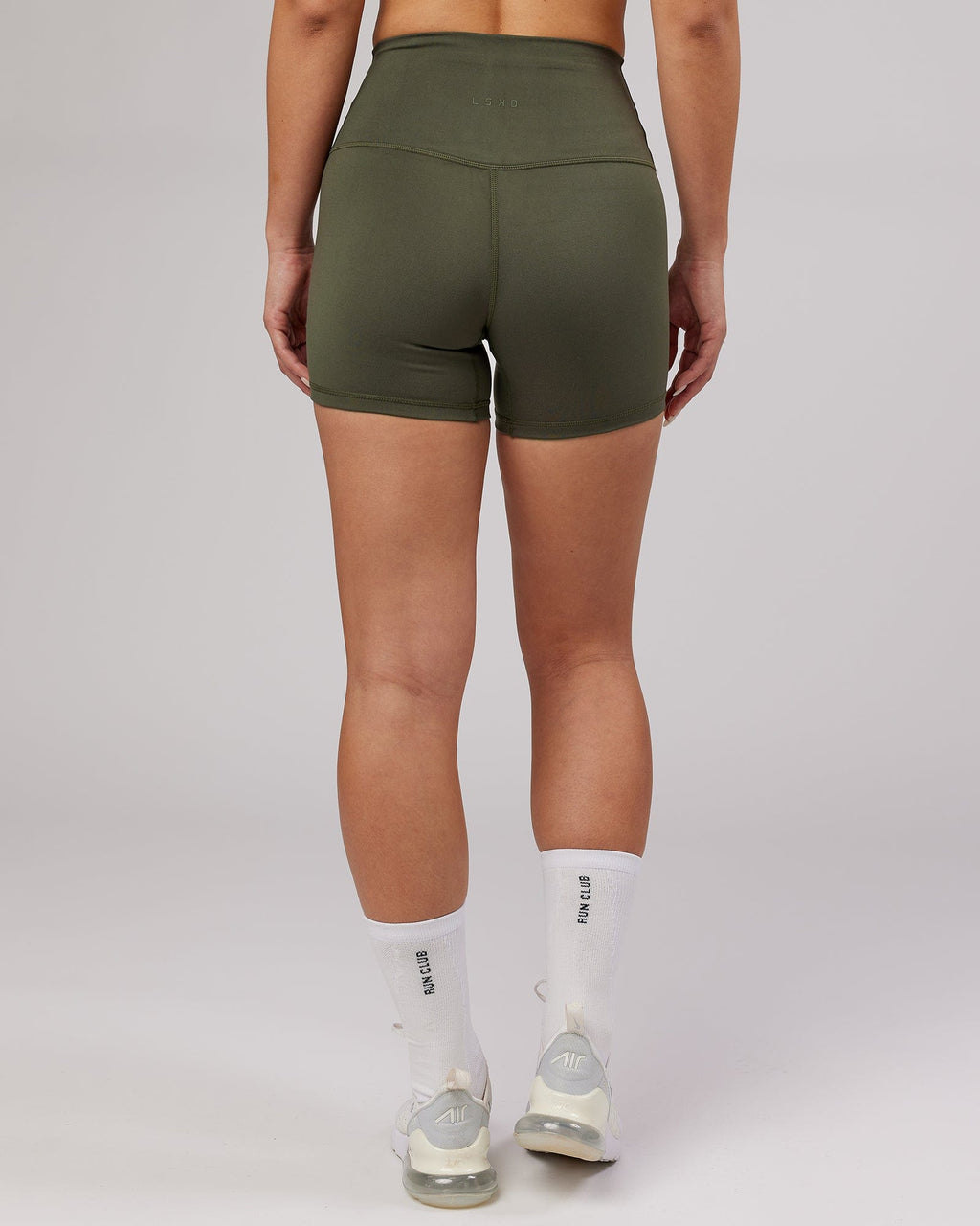 Model wearing Base X-Short Tight - Forest Night