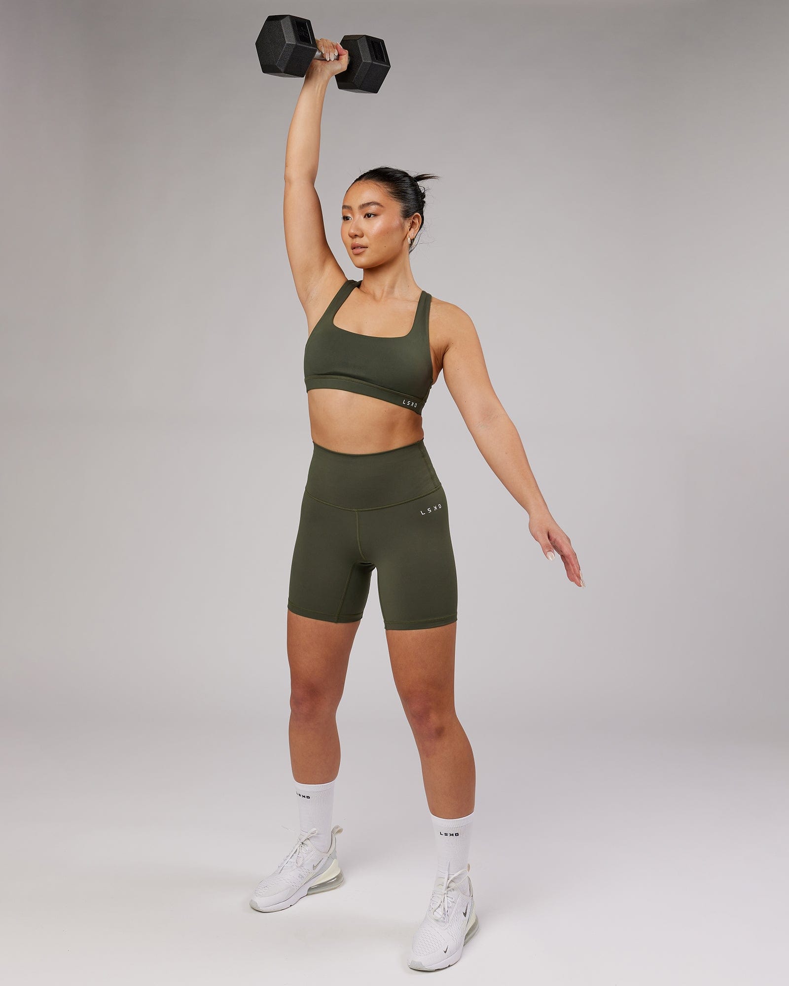 Model wearing Base Mid Short Tight - Forest Night