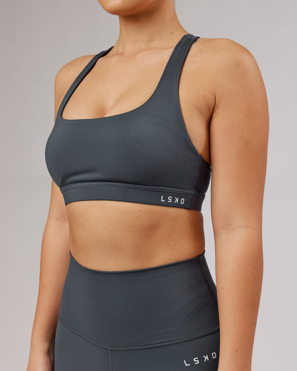 Model wearing Base Sports Bra - Ink