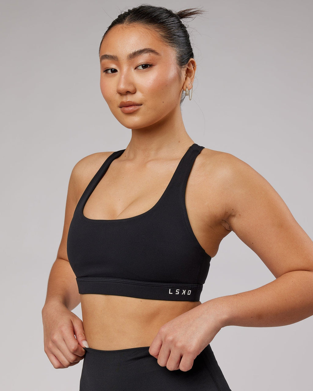 Model wearing Base Sports Bra - Black