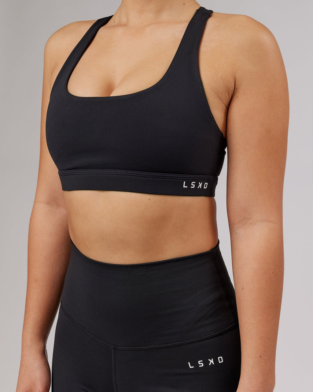 Model wearing Base Sports Bra - Black