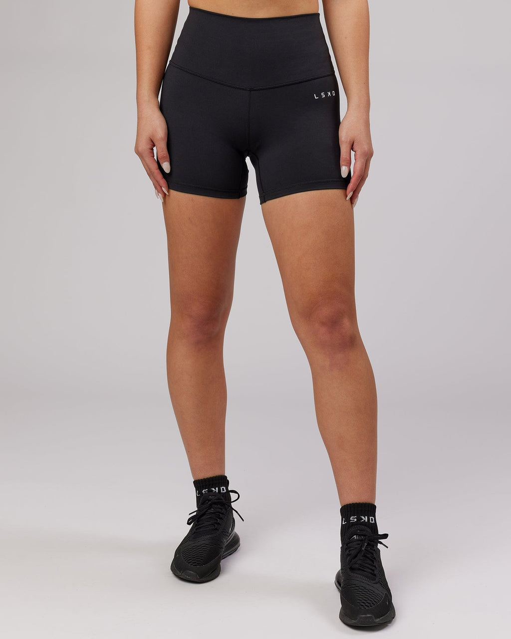 Model wearing Base X-Short Tight - Black