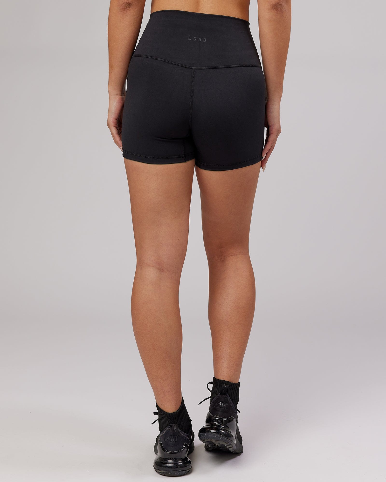 Model wearing Base X-Short Tight - Black