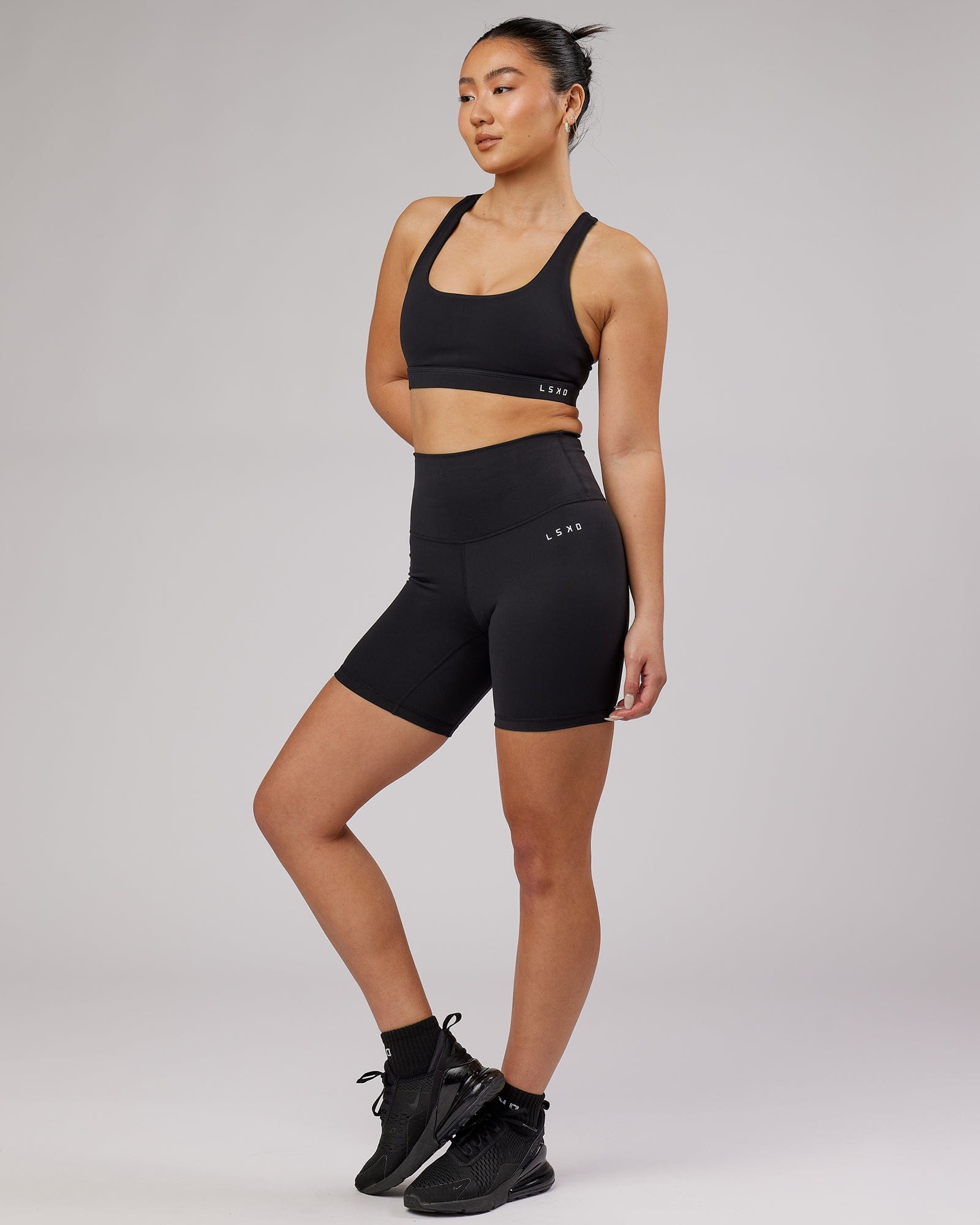 Model wearing Base Mid Short Tight - Black