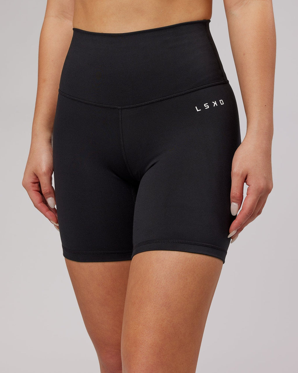 Model wearing Base Mid Short Tight - Black