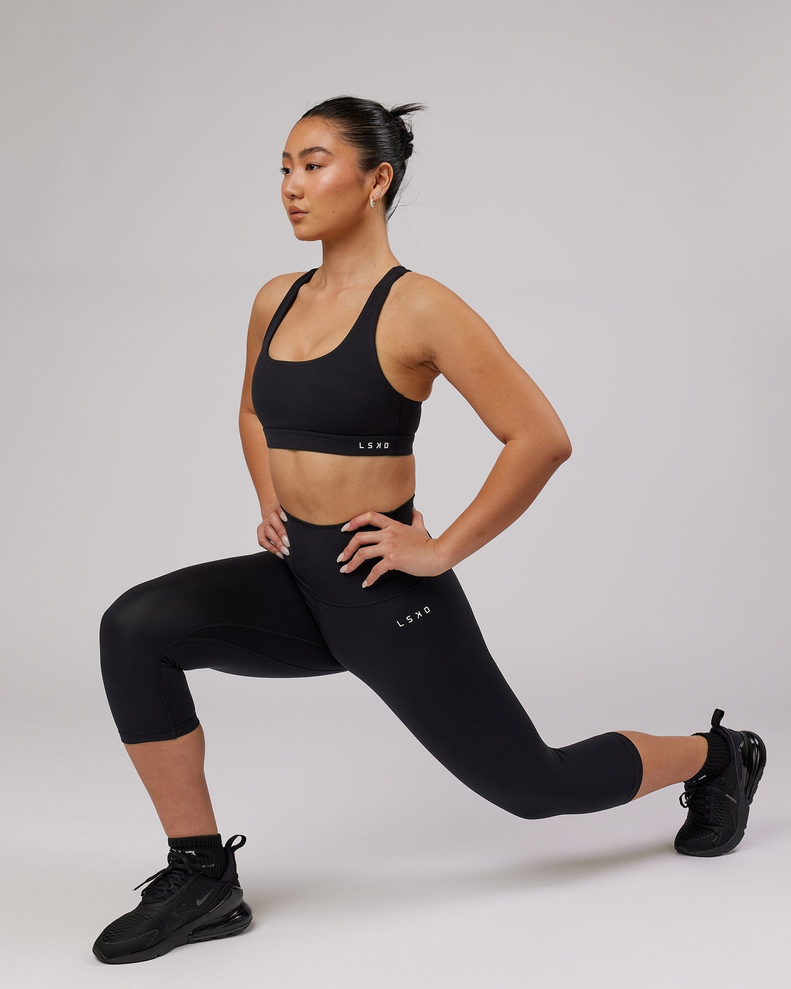 Model wearing Base 3/4 Length Tight - Black