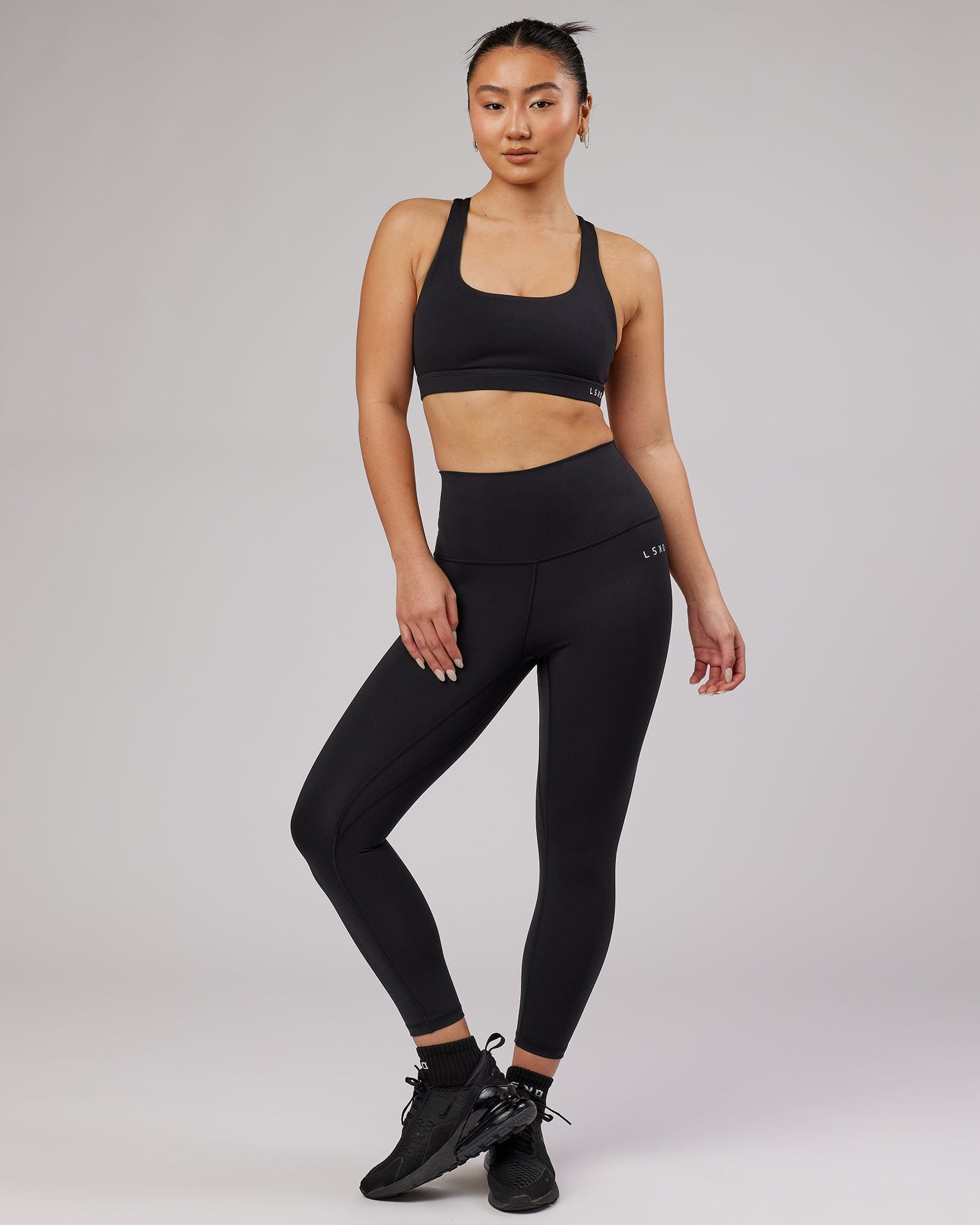 Model wearing Base 7/8 Length Tight - Black