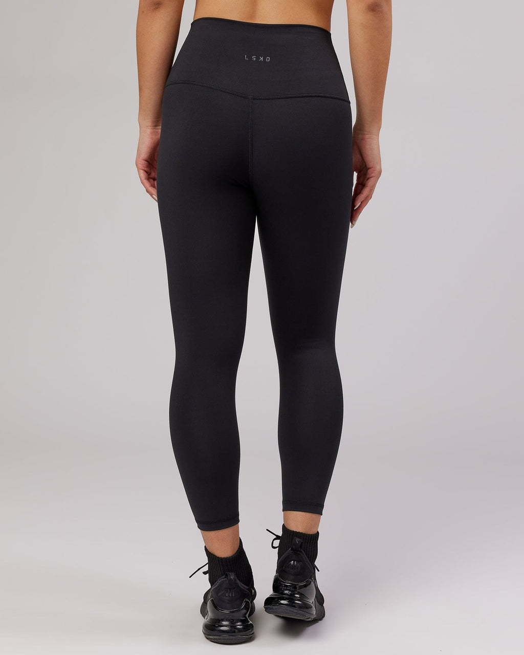 Model wearing Base 7/8 Length Tight - Black