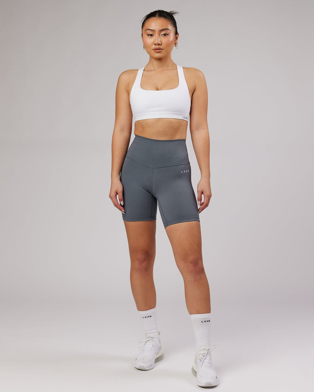 Model wearing Base Sports Bra - White