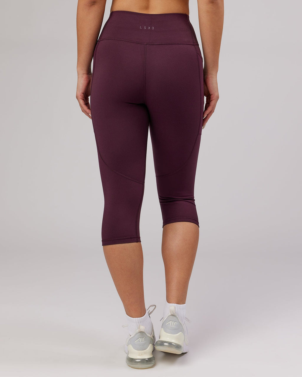 Model wearing Rep 3/4 Length Tight Small Logo - Wine
