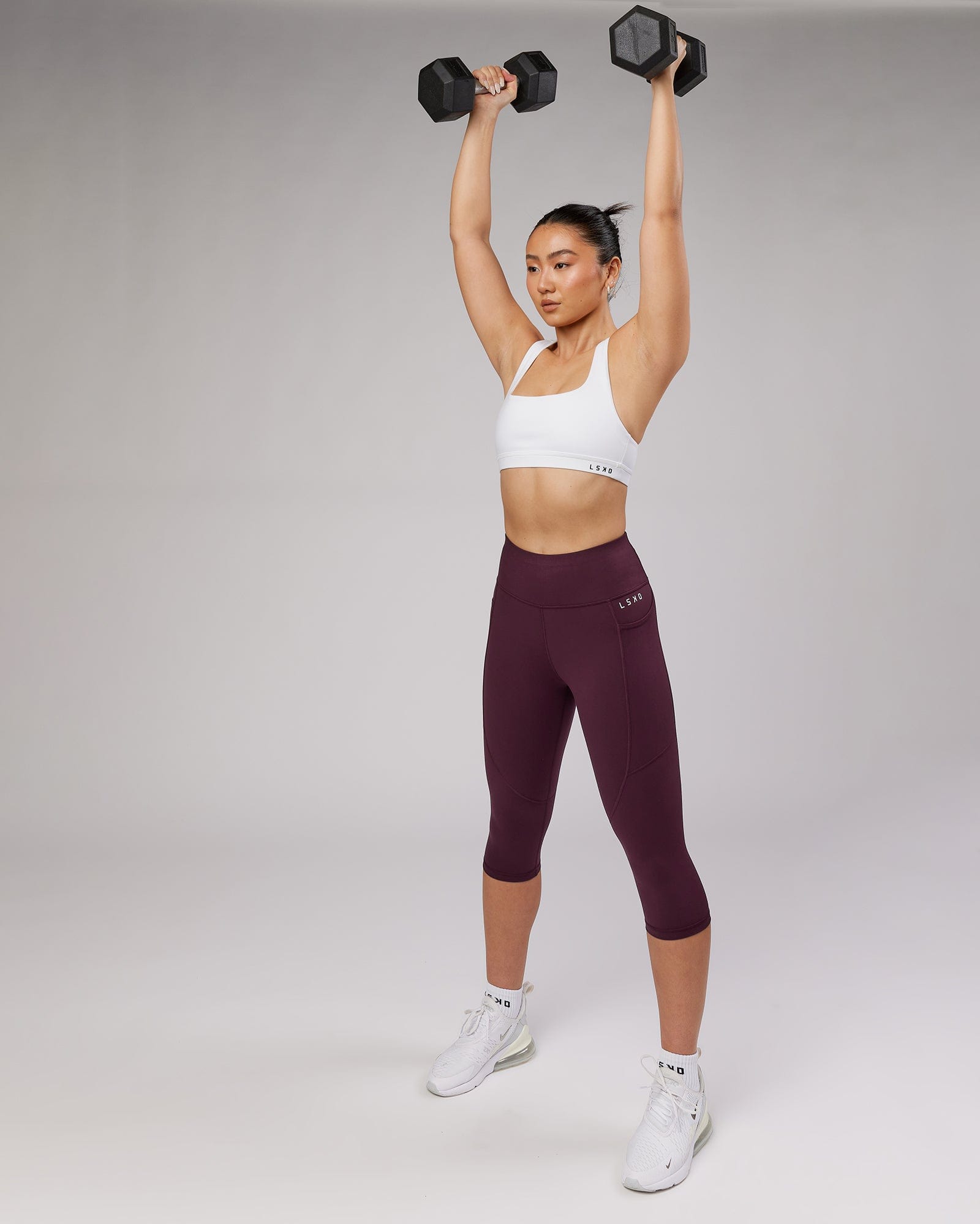 Model wearing Rep 3/4 Length Tight Small Logo - Wine