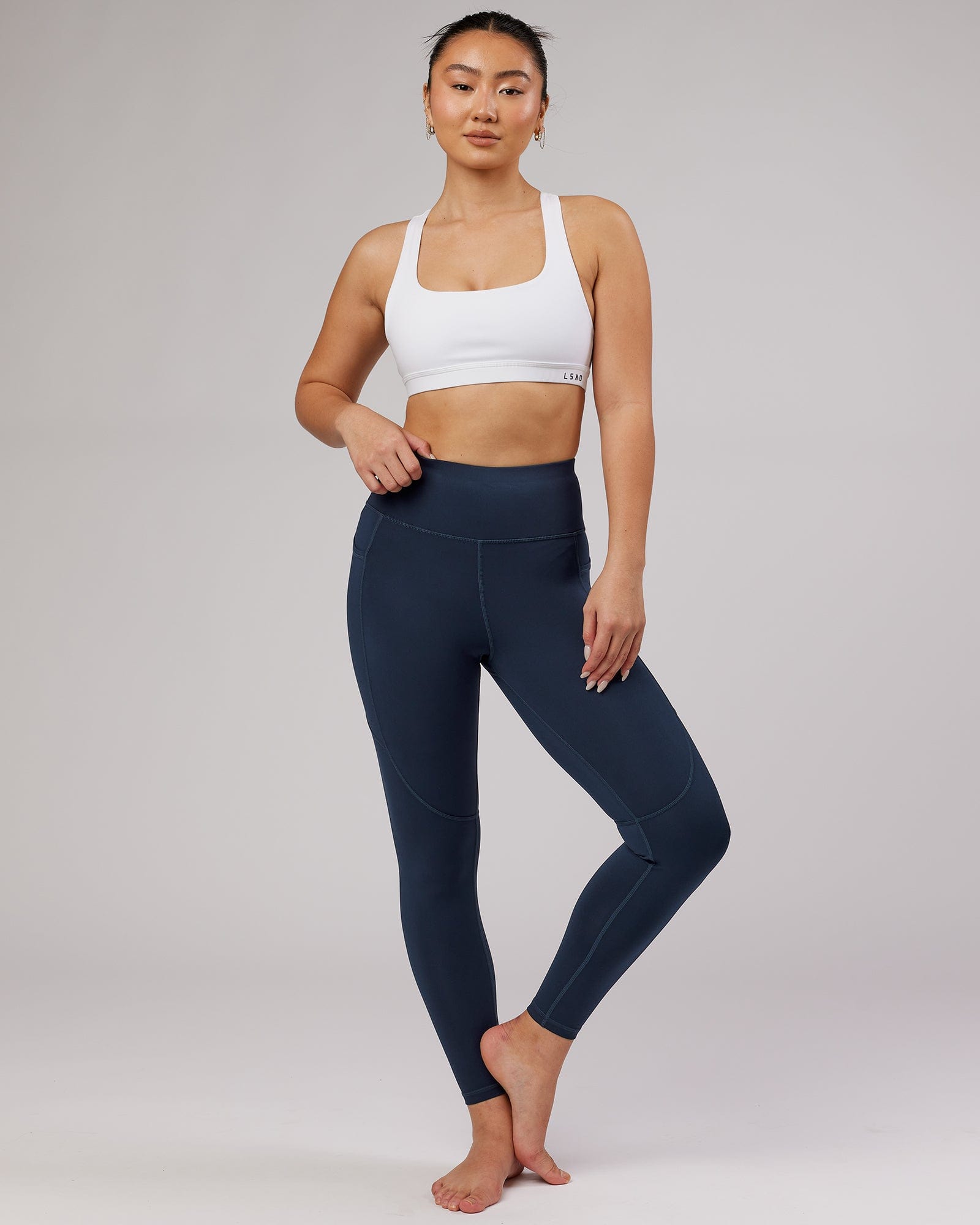 Model wearing Rep Full Length Tight - Navy